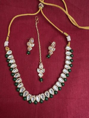 2. Traditional Kundan Choker Necklace Set with Pearl Drops