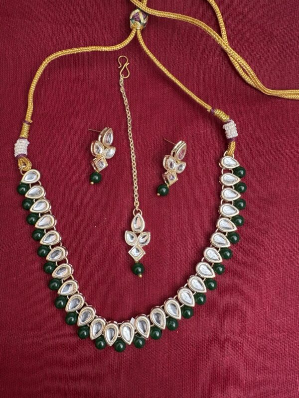 2. Traditional Kundan Choker Necklace Set with Pearl Drops